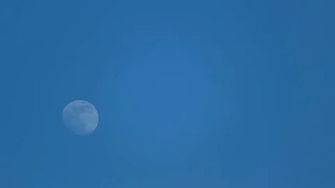 Full moon moving in blue sky, lunar calendar phases, luck superstitions, nature Stock-Footage 75902988