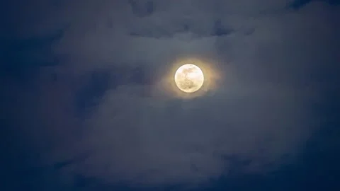 Full moon with moving clouds in the dark sky at night. Stock Footage 149096347
