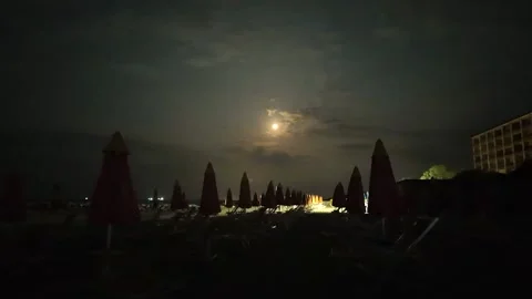 A full moon at night on the beach, time lapse Stock Footage 280049343