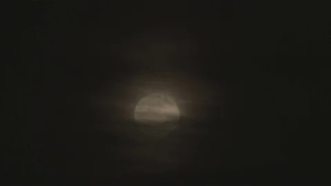 Full moon at night behind cloud Stock Footage 74073399