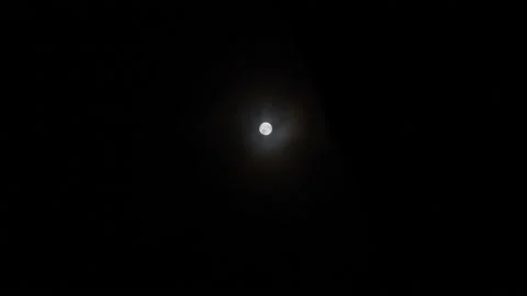 Full Moon Night Dark Sky With Passing Clouds. The Moon Turns To A Blurry Sphere Stock Footage 137502901