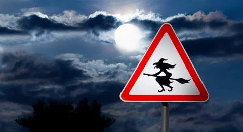 Full Moon in the Night Sky and Witch Road Sign Stock Photos