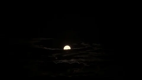 Full moon in the night sky, bright moon, night sky, the motion of clouds in the Stock Footage 110793368