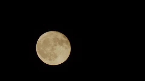 Full moon night sky with clouds. Yellow moon in the night sky Stock Footage 116745401