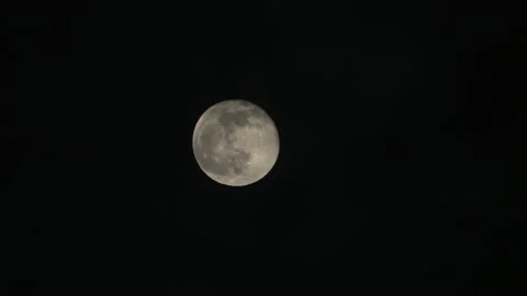 Full moon at night sky with clouds Video stock 133560901
