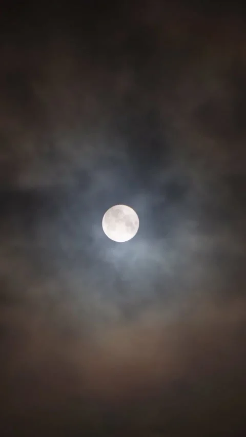 A full moon in the night sky with clouds. A time of mysticism,magic. Stock Footage 267647516