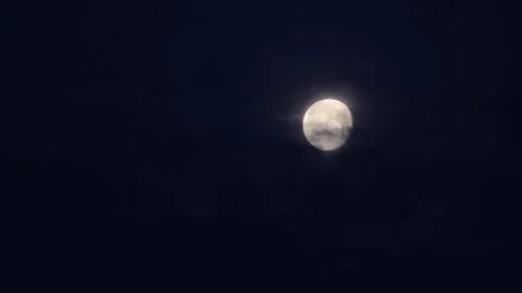 A full moon on a night sky Stock Footage 175714118