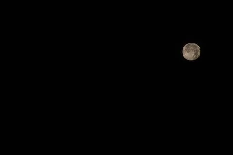 Full moon in the night sky. Full Ominous moon against the background Stock Photos
