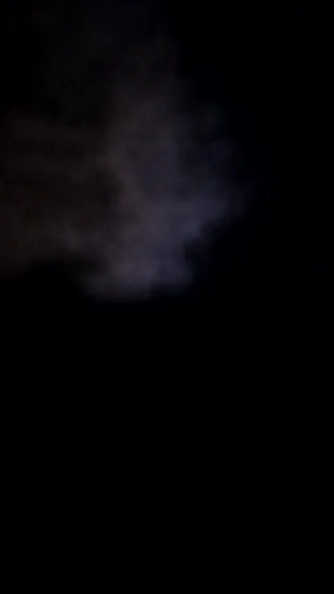 Full moon at night with thick clouds. Time lapse of the night sky. Vertical Stock Footage 250382186