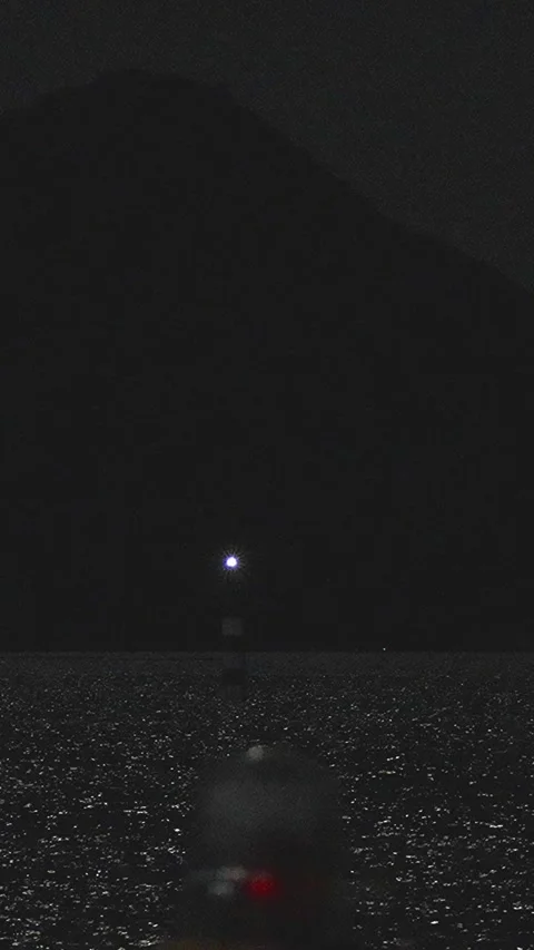 Full moon night view guide light marine signal and Ninoshima silhouette,Vertical Stockbeeldmateriaal 347597230