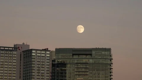 Full moon over baltimore harbor Stock Footage 81888681