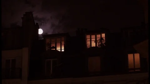 Full moon over Champs Elysees Paris France building home night Stock Footage 105815344