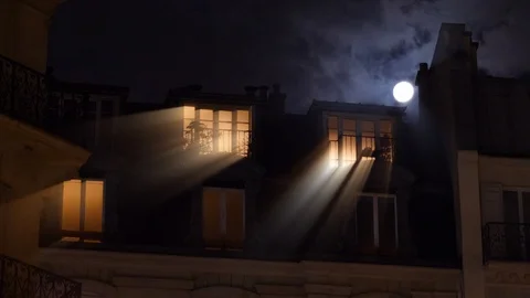 Full moon over Champs Elysees Paris France people mansarde roof Stock Footage 105815742