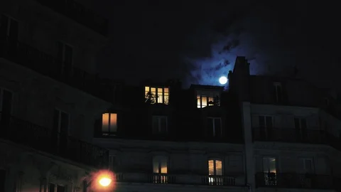 Full moon over Champs Elysees Paris France building home night Stock Footage 105816416