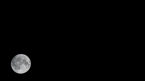 Full moon over dark black sky at night Stock Footage 106452825