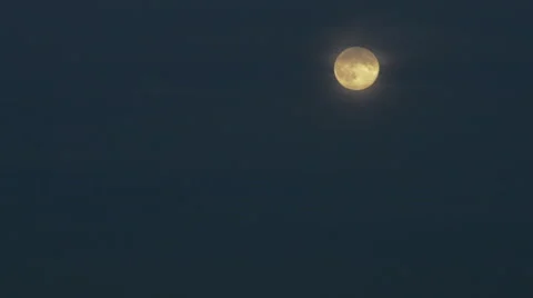 Full moon over dark blue sky. Video stock 64783798