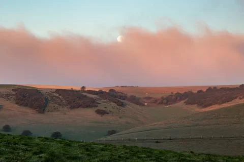 A Full Moon over the South Downs at Dawn Stock Photos