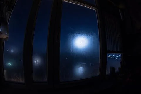 Full moon over the valley in window view. Fisheye lens shot wind angle Stock Photos