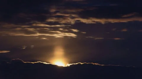 Full moon passing between layers of clouds Stock Footage 82706490