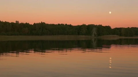 Full moon reflecting in a lake Stock Footage 70861050