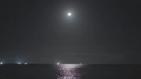 Full Moon Reflection Over Calm Ocean at Night. Serene Night Seascape with M.. Stock Footage 308357298