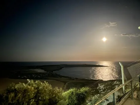 Full Moon Reflection Over Cape Greco, Cyprus  Illuminated Night Sky and Tra.. Stock Photos