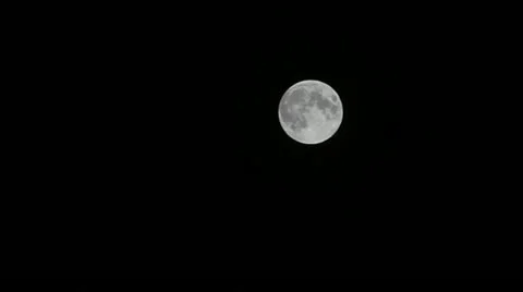 Full moon with relief spots on the black sky. shooting with the increase in e Vídeo Stock 12646516
