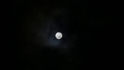 Full moon revealed by dark clouds at night. Island Koh Phangan, Thailand Stock Footage 76923719
