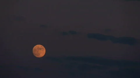 Full moon rise in night glowing Stock Footage