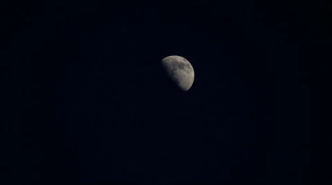 Full moon rise in night glowing Stock Footage
