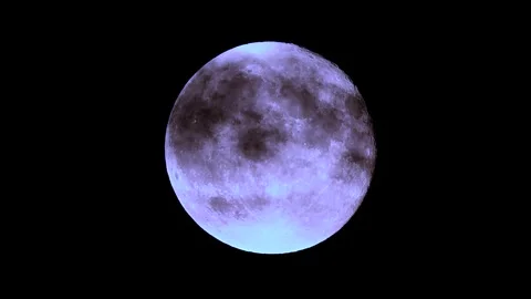 Full moon rise through clouds creates stunning night sky spectacle in cinematic Stock Footage 305430747
