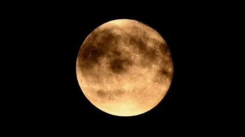 Full moon rises through clouds in spectacular night sky timed in cinematic Stock Footage 305430780
