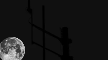 Full Moon Rising Behind Communication Tower - Time Lapsed Video stock 85589676