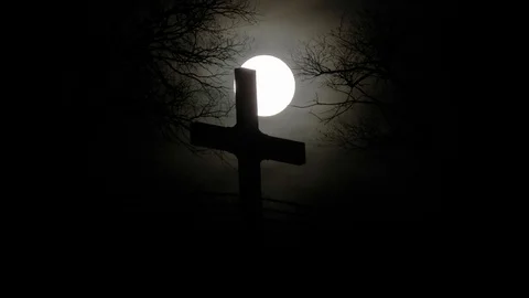 Full moon rising behind Cross of the Martyrs Santa Fe New Mexico Stock Footage 105484241