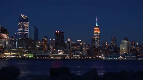 Full Moon rising next to the Empire State Building​ at Sunset Time-Lapse Stock Footage 74132353