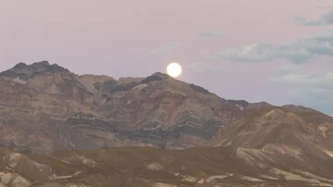 Full Moon Rising Over Rugged Mountain Peaks Stock-Footage 331090746