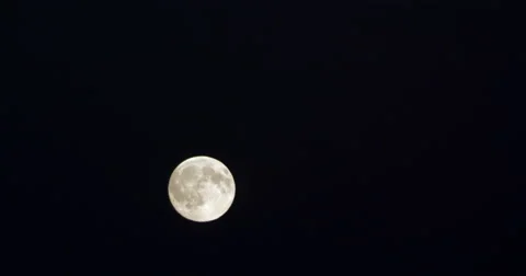 Full moon rising through frame TIME LAPSE Video stock 68154751