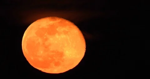 Full Moon Rising Time Lapse with Red Glow and Clouds Stock Footage 126093344