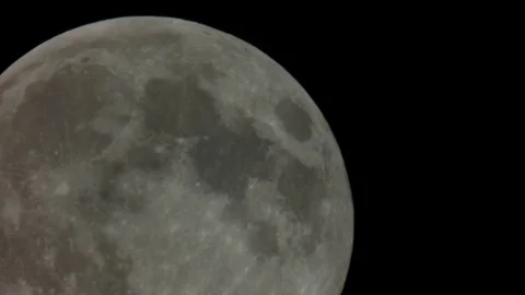 Full moon seen through a telescope which increases more Stock Footage 71916208