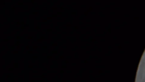 Full moon seen through a telescope, which increases more Vídeo Stock 91921226
