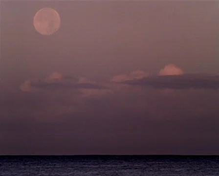 Full Moon Sets over Ocean PAL Video stock 532010