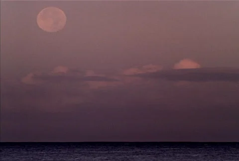 Full Moon Sets over Ocean NTSC Stock Footage 532011