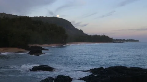 Full moon setting, Lumahai Beach, Kauai, Hawaii Stock Footage 41752125