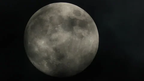 Full moon shining brightly in the dark night sky with passing clouds Stock Footage 342248245