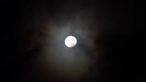 Full moon shining on cloudy night sky background. Beauty in nature Stock Footage 295462666