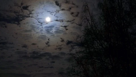 Full moon shining over colorful cloudy horror sky time lapse Stock Footage 88055805