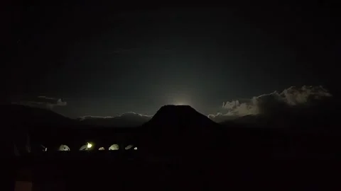 Full moon shining over Tibet Plateau campsite and mountains Stock Footage 333350239