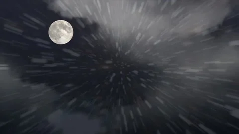 Full moon shining through rapidly moving clouds and falling snow in night sky Stock Footage 340940558