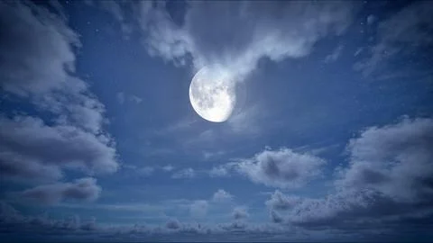 Full moon on the starry sky with clouds moving at night 스톡 사진