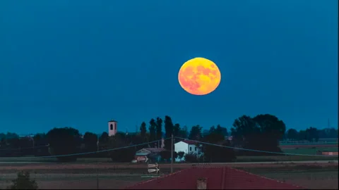 Full moon sunrise Stock Footage 254980543
